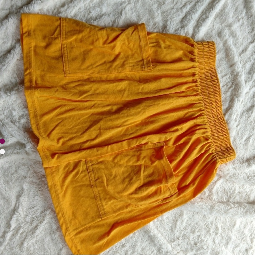 ISO mustard-colored American Apparel jersey pocket skirt! ✨